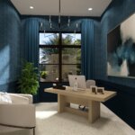 Modern home office with a wooden desk, white chair, potted plant, large abstract painting, blue walls, and a window with blue curtains overlooking greenery.